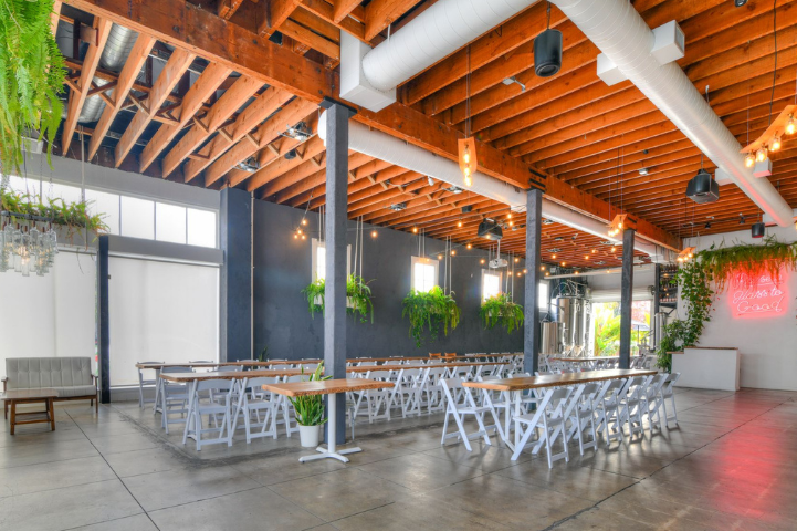 FruitCraft’s rustic-modern reception area styled for a wedding celebration in San Diego.