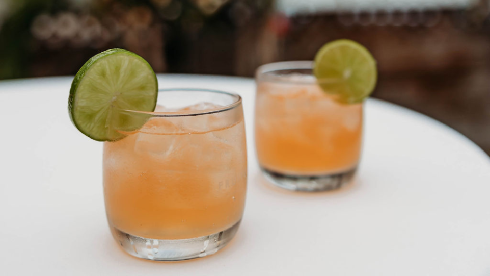 Cocktails with lime garnish served at FruitCraft San Diego