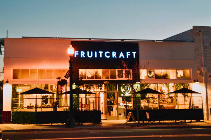 FruitCraft building facade at night in San Diego