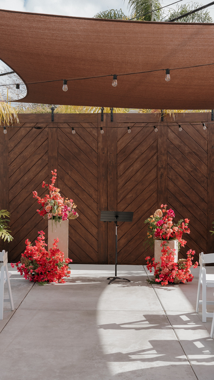 Spring wedding with bright florals and plant greenery at FruitCraft San Diego